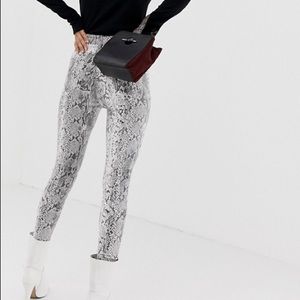 Snake skin skinny jeans